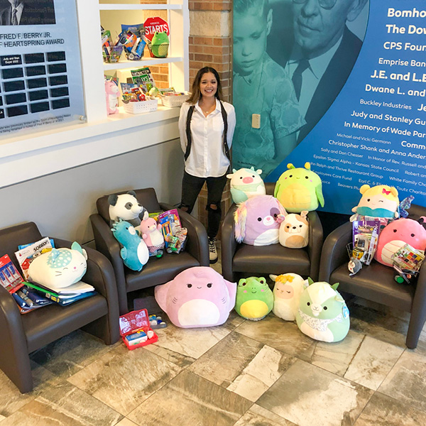 Newman Senior with toys and squishmallows