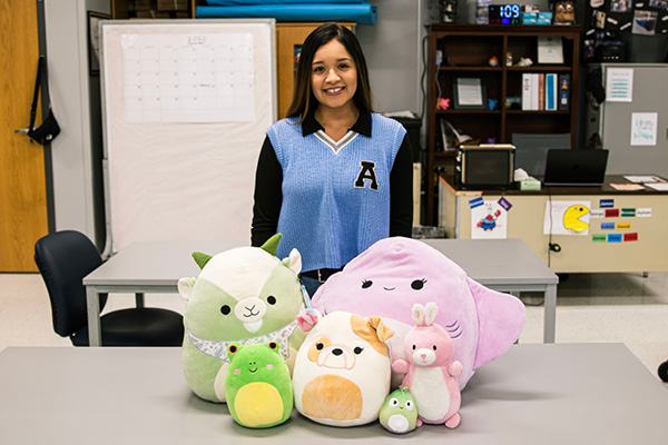 Newman Senior with toys and squishmallows