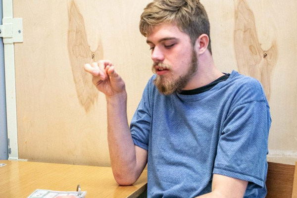 Heartspring student sitting at a desk