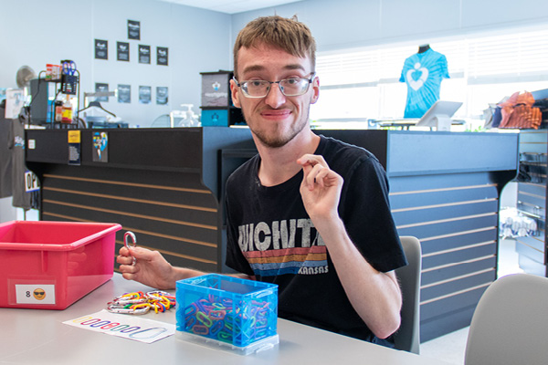 Heartspring student working on a vocational training sorting task