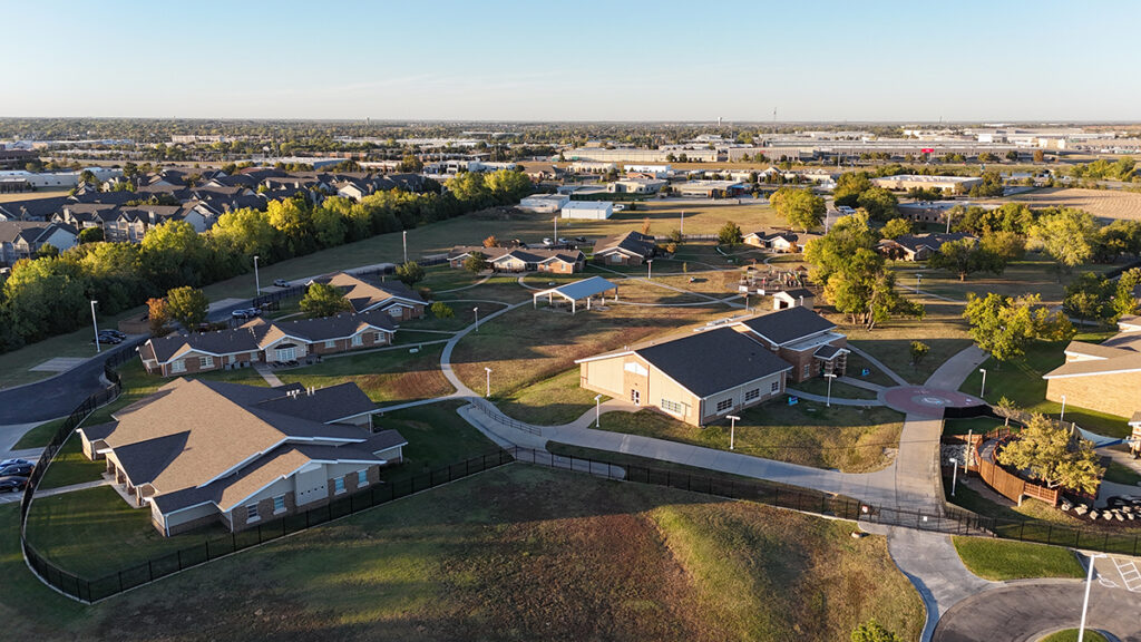 Bird's-eye view of the Heartspring campus looking toward the residential group homes, vocational and music building, and gym