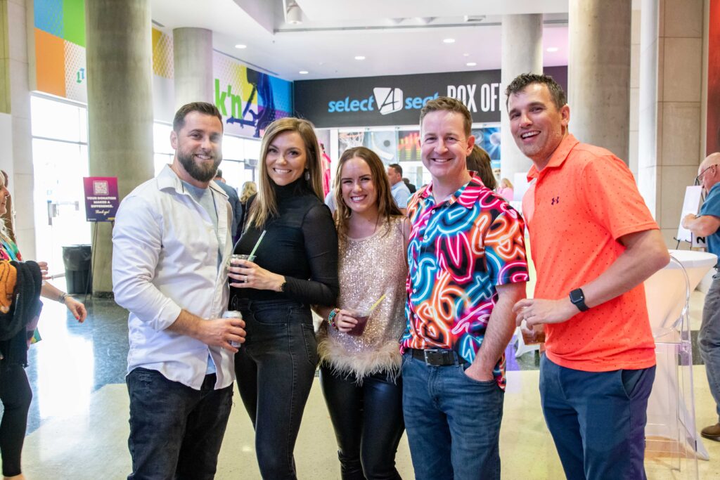 Group of Heartspring Gala guests smiling and posing for a photo