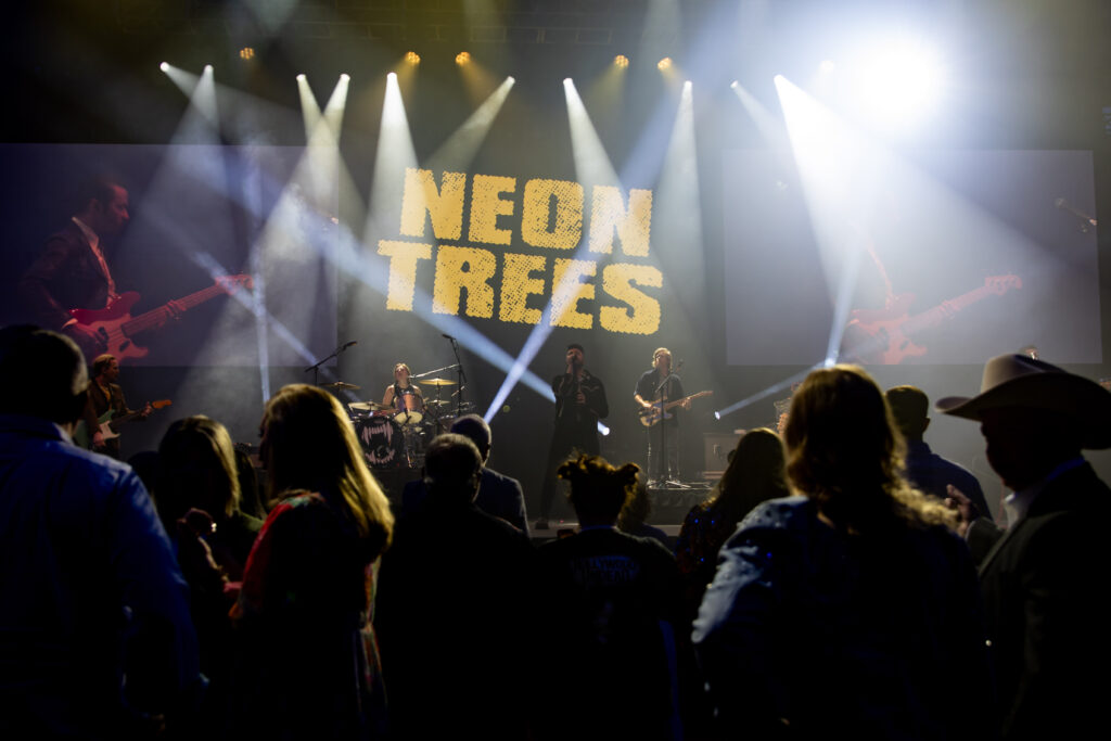 Neon Trees band on stage performing for Heartspring Gala guests at INTRUST Bank Arena