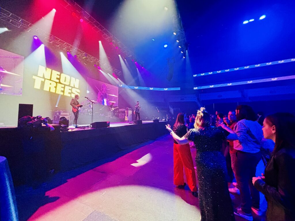 Neon Trees band on stage performing for Heartspring Gala guests at INTRUST Bank Arena