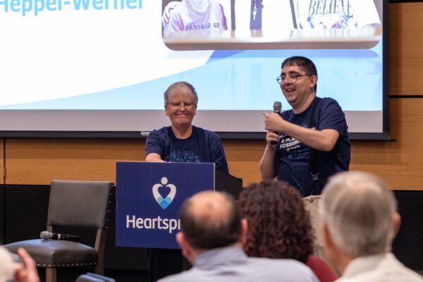 Brandon Von Liski presents his Heartspring success story with his former teacher, Ruth Heppel Werner.