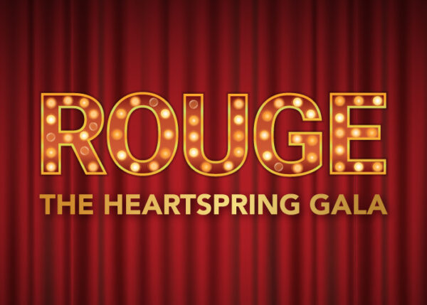 ROUGE The Heartspring Gala on a red curtain background