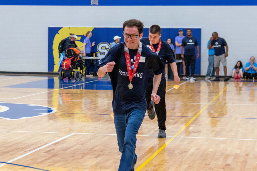 Heartspring student runs in the Special Olympics Track and Field event.