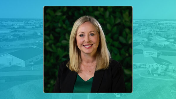 Diretcor of Admissions & Student Outreach, Cara Rapp, smiles in her Heartspring portrait.