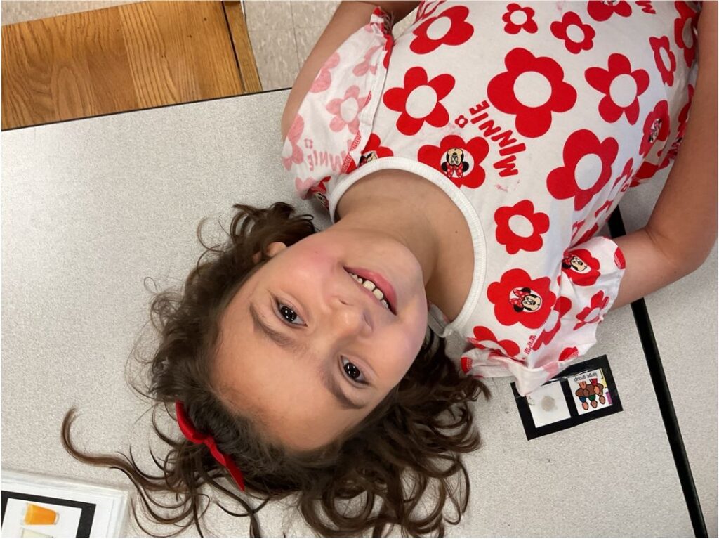 Scarlett at her desk in the Heartspring Therapeutic School.