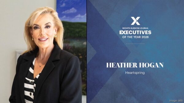 Graphic with "Wichita Business Journal Executive of the Year Heather Hogan" with Heather smiling in a picture beside the text.